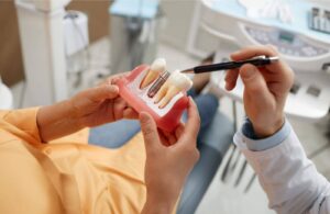 Tooth replacement options – dentures and implants